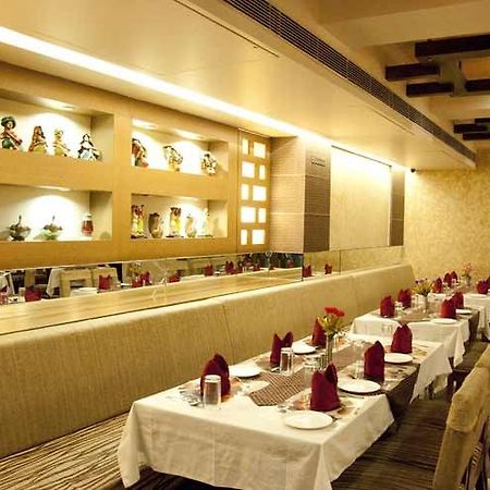 Harmony Hotel Rajkot Bagian luar foto